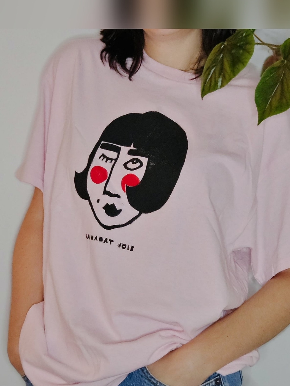 Light Pink Graphic Tee with Black & Red Face Linocut Print